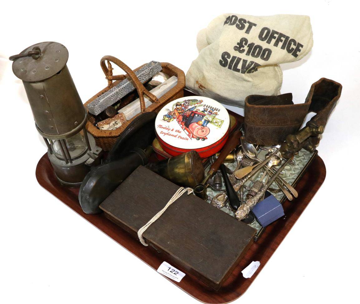 Lot 122 - A quantity of collectors items including a miners lamp, two gun shot flasks, a corkscrew,...