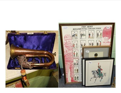 Lot 135 - A copper bugle with Royal Artillery badge; a cased set of eight brass and copper miniature...