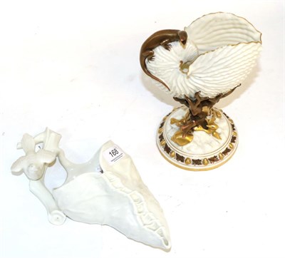 Lot 168 - A Royal Worcester leaf and bird form wall pocket together with a Royal Worcester nautilus shell and