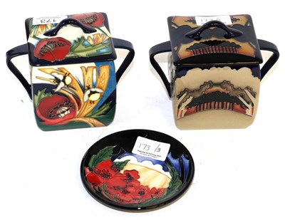 Lot 173 - Three pieces of Moorcroft pottery comprising a Forever England pattern coaster, an Eventide...