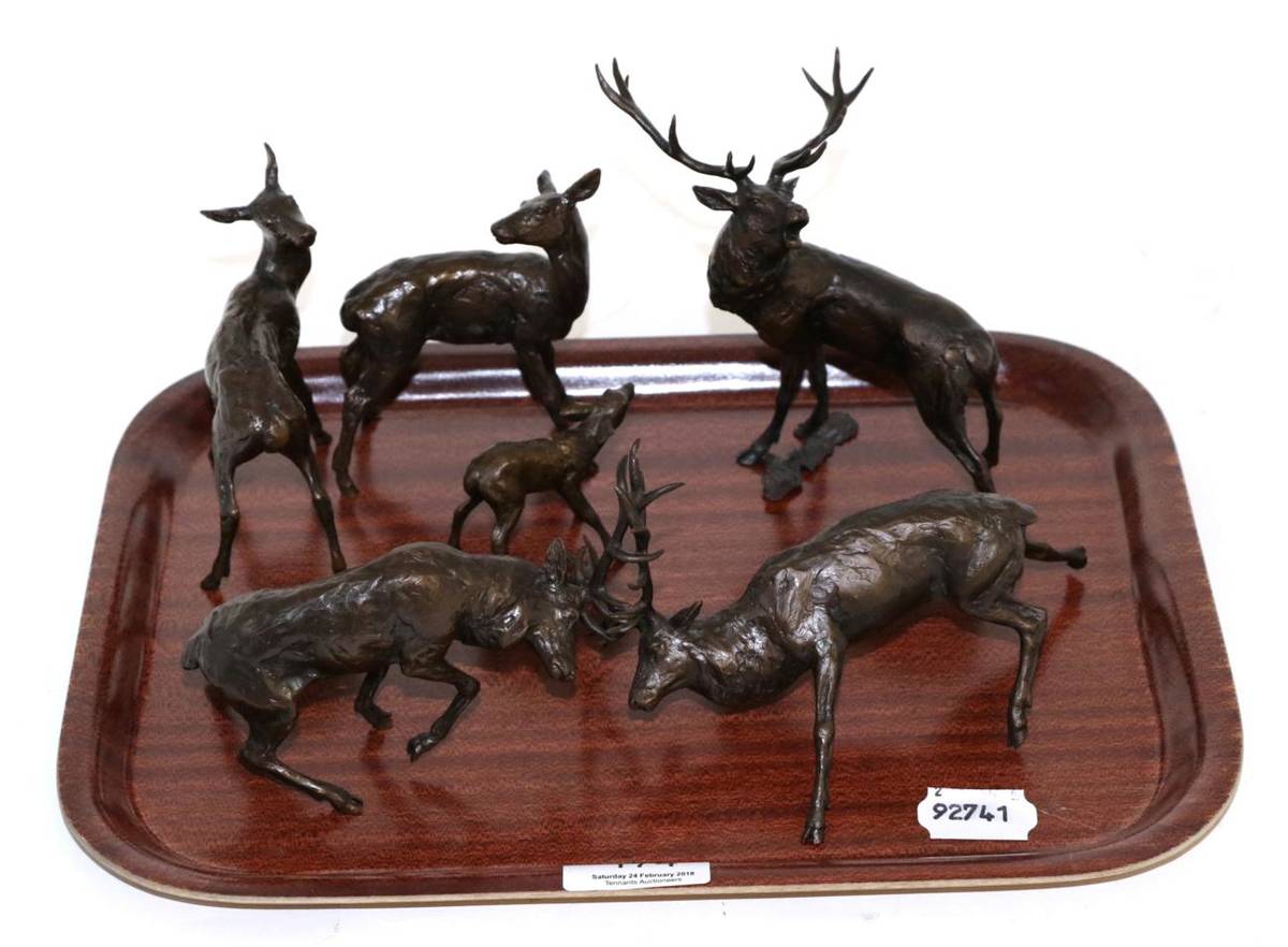 Lot 174 - A group of Richard Cooper & Company bronze stags, hinds and fawns