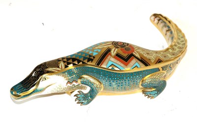 Lot 175 - A Royal Crown Derby Imari alligator paperweight with gold coloured stopper