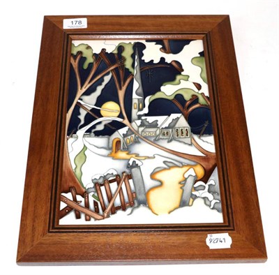 Lot 178 - A Moorcroft pottery plaque designed by Kerry Goodwin in a trial pattern with a church in a...