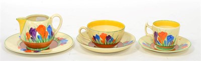 Lot 193 - Clarice Cliff Bizarre Crocus pattern items comprising of two cups and saucers, side plate and jug