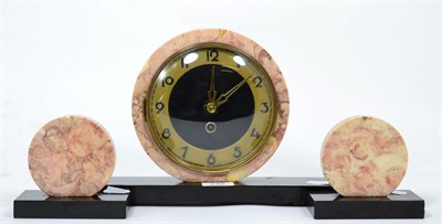Lot 212 - A 1920s/30s pink marble clock garniture