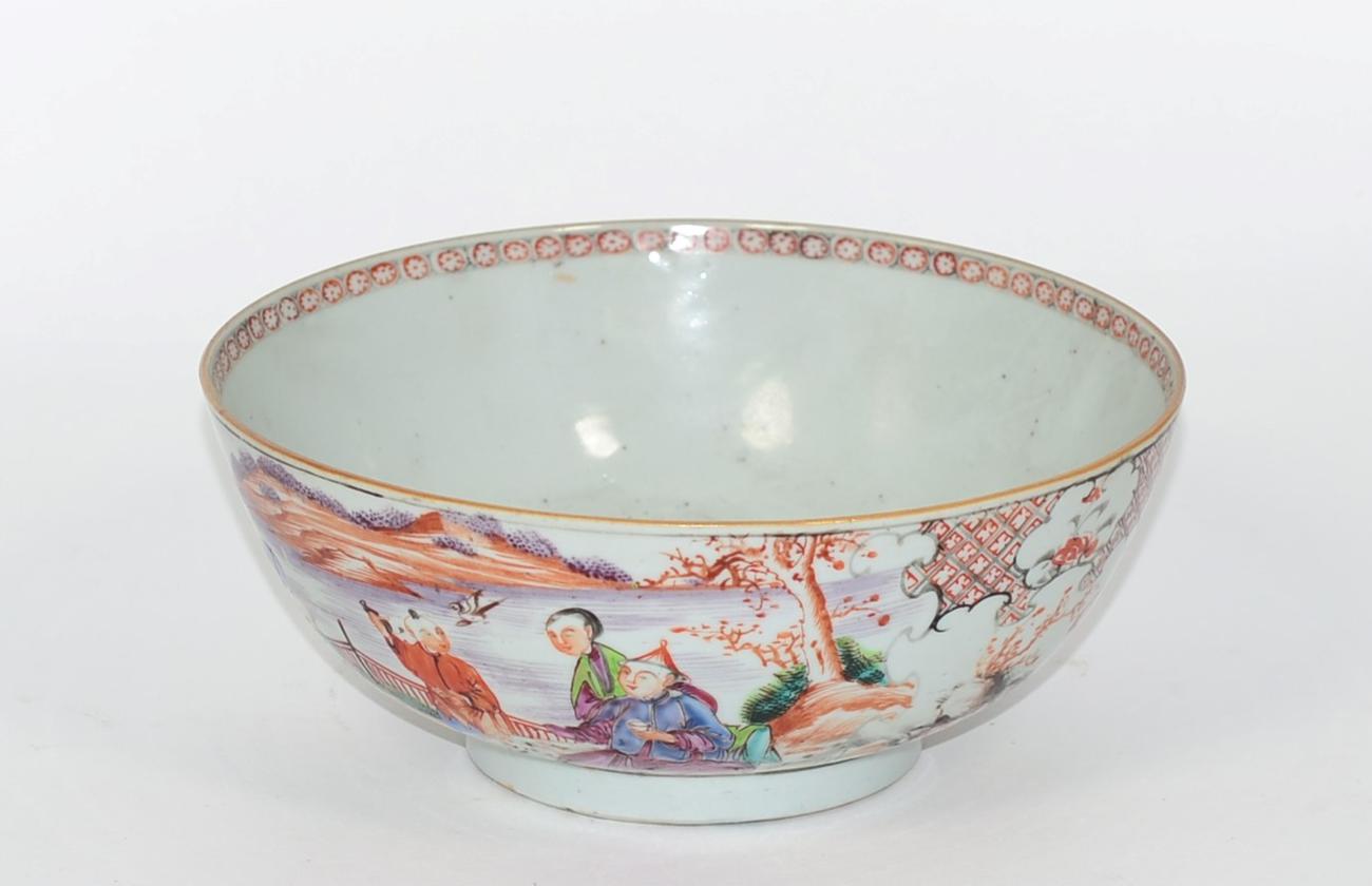 Lot 225 - A Chinese Qing Long period famille rose bowl decorated with figures in a landscape