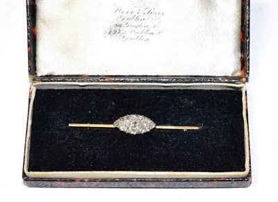 Lot 239 - A diamond bar brooch, a navette-shaped plaque pavé set with old cut diamonds, to a flat sided bar
