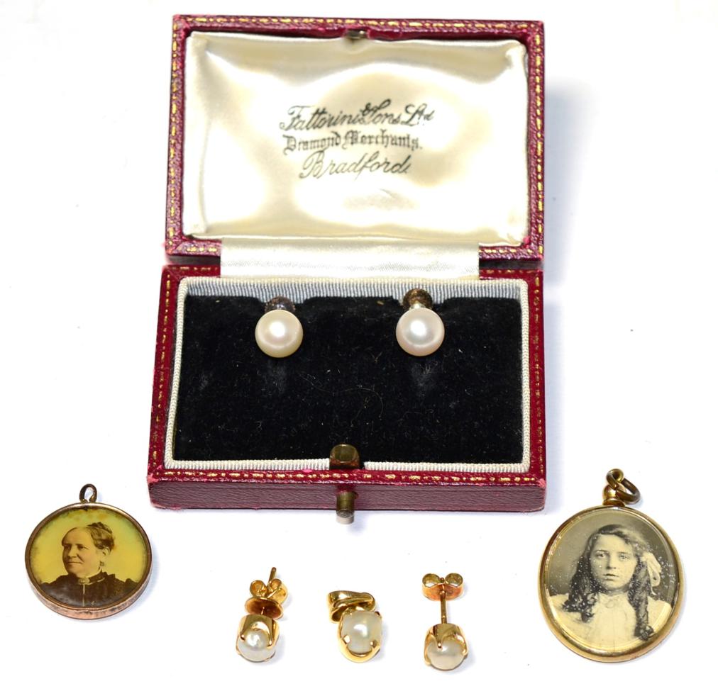 Lot 246 - A pearl earrings and pendant suite, the earrings with post fittings, stamped '750'; a pair of...