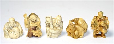 Lot 252 - Five Japanese Meiji period carved ivory netsukes in the form of various traders (5)