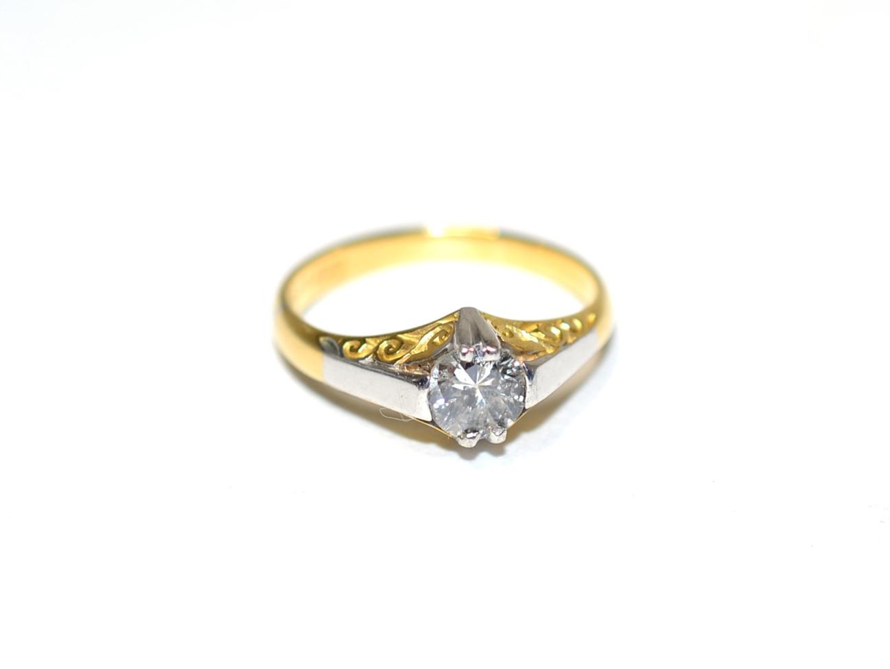 Lot 266 - A solitaire diamond ring, a round brilliant cut diamond in a claw setting, to tapered scroll...