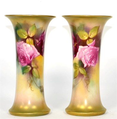 Lot 277 - A pair of Royal Worcester vases signed K H Blake, rose flower decorated
