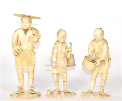 Lot 281 - Three Japanese Meiji period ivory okimonos of farmers (a.f.)