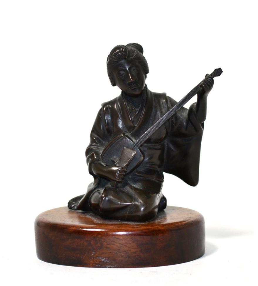 Lot 345 - A Japanese bronze figure of a Shamisen player