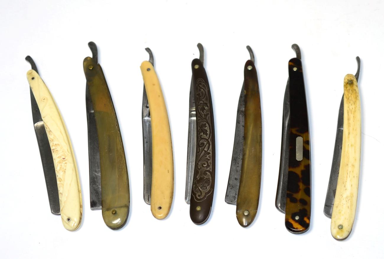 Lot 354 - A group of seven Sheffield cut-throat razor blades comprising; a tortoise shell example by...
