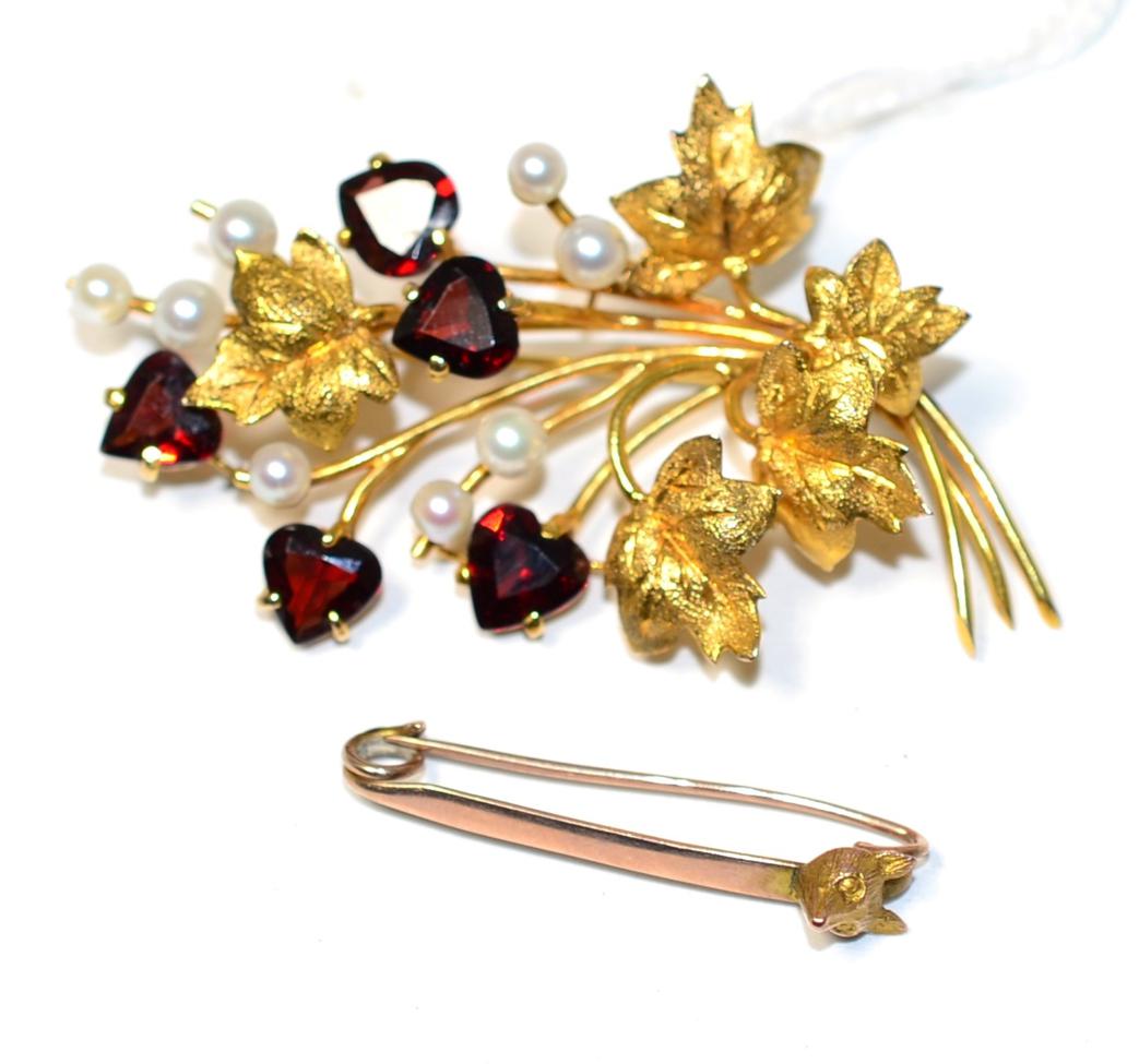 Lot 358 - A garnet and cultured pearl spray brooch, heart cut garents in claw settings and cultured pearls to