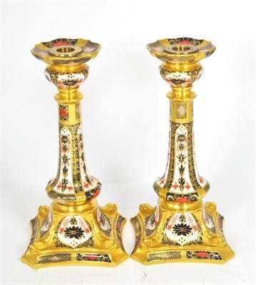 Lot 6 - A pair of Royal Crown Derby Imari candlesticks, pattern 1128, 26.5cm