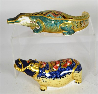 Lot 17 - A Royal Crown Derby Imari paperweight of an alligator with silver stopper and another...