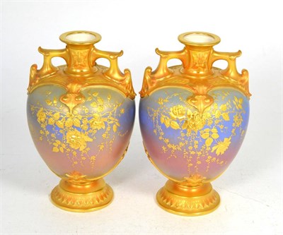 Lot 22 - A pair of Royal Worcester blue lustre and gilt vases, shape number 1654, 20cm