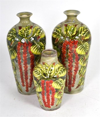 Lot 36 - Three Cobridge stoneware vases in a foliate trail pattern date 3/11/00, the smallest 16.5cm,...