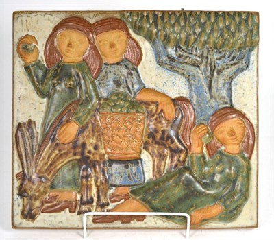 Lot 39 - A Michael Andersen relief decorated plaque, depicting apple pickers, 33cm by 28.5cm