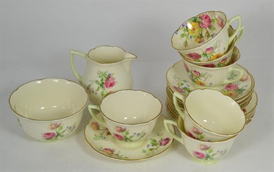 Lot 58 - A Royal Doulton Moss Rose pattern part tea service for six comprising tea cups saucers side...