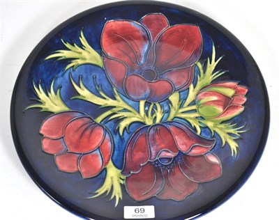 Lot 69 - A Moorcroft pottery Anemone pattern charger, date '89, 35.5cm diameter