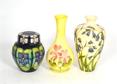 Lot 73 - A Moorcroft Violet pattern ginger jar and cover, 10cm, a Moorcroft Geranium pattern vase, 16cm...