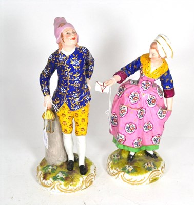 Lot 75 - A pair of continental painted porcelain figures