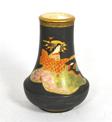 Lot 81 - A Satsuma earthenware vase, Meiji period, of swept cylindrical form, painted with geishas on a matt