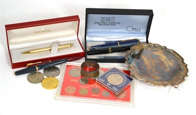 Lot 85 - A silver salver; assorted gold nib fountain pens; assorted modern coinage; and a leather bound...