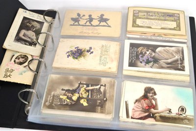 Lot 95 - An album of postcards including; Mabel Lucie Attwell, early 20th century photographic examples