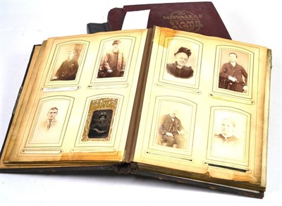 Lot 97 - Two stamp albums and a photograph album (3)
