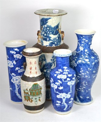 Lot 118 - A Chinese blue and white prunus and cracked ice sleeve vase, together with two similarly...