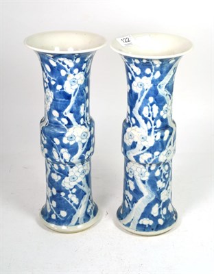 Lot 122 - A pair of 20th century Chinese blue and white prunus vases with flared rims