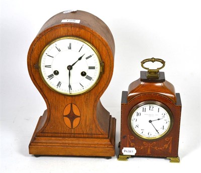 Lot 128 - An Edwardian inlaid mahogany mantel clock with painted dial, Goldsmith & Silversmith Company,...