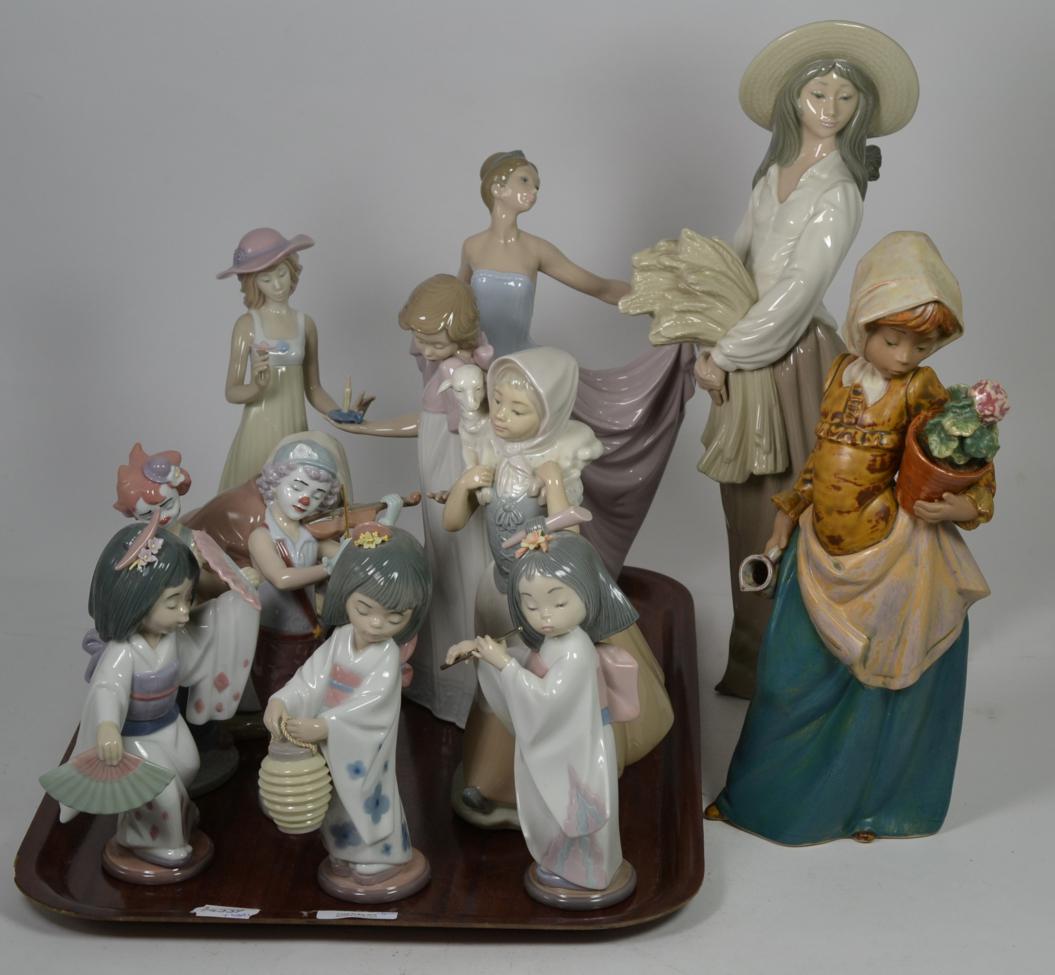Lot 129 Lladro and Nao figures