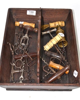 Lot 130 - A collection of nineteen vintage corkscrews and a mahogany cutlery tray