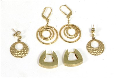 Lot 175 - Three pairs of 9 carat gold earrings, comprising a pair of hammered disk earrings, a pair of...