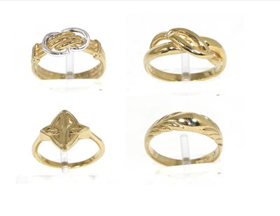 Lot 204 - A 9 carat gold Celtic motif navette ring, finger size N; a 9 carat two colour gold knot ring,...