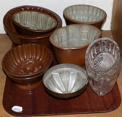 Lot 230 - A tinned copper jelly mould, 19th century, of fluted ovoid form, 13.5cm; a brown saltglaze...