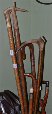 Lot 232 - Seven walking sticks including antler horn and ivory handled examples