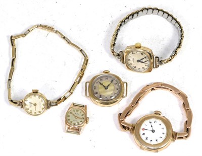 Lot 257 - A gents 9ct gold cushion shaped wristwatch, four ladies 9ct gold wristwatches, and another...