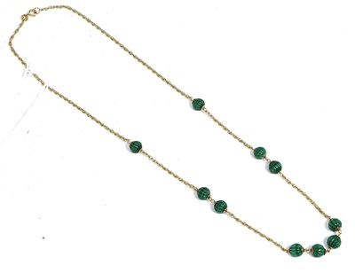 Lot 273 - A 9 carat gold malachite bead necklace, carved malachite beads at intervals to a Prince of...