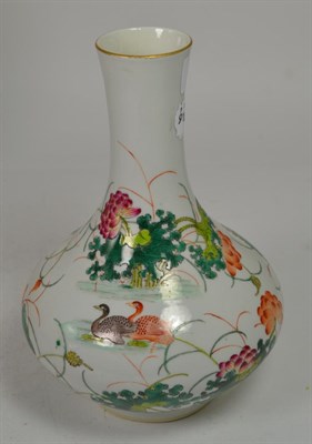 Lot 292 - A Chinese porcelain pear shaped vase, Daoguang reign mark but not of the period, painted in famille