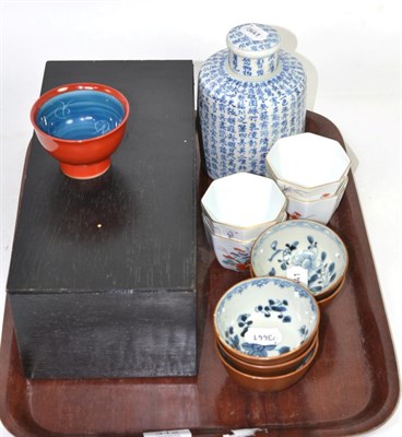 Lot 312 - A set of five Chinese blue and white tea bowls with capucin brown ground, 18th century, some...