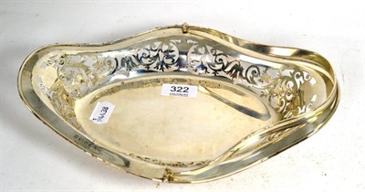 Lot 322 - A silver pierced basket with swing handle