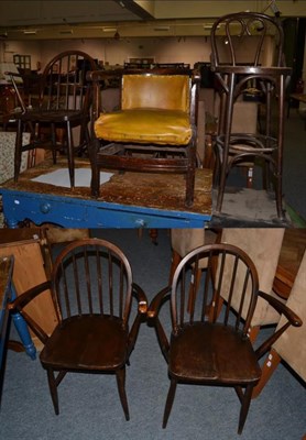 Lot 1085 - Set of three dark elm Ercol elbow chairs and a bentwood stool together with an early 20th...