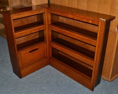 Lot 1087 - A 1940's oak corner bookcase