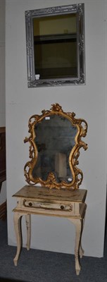 Lot 1093 - A cream and gilt painted small table, an early 20th century mirror and a silver painted modern...