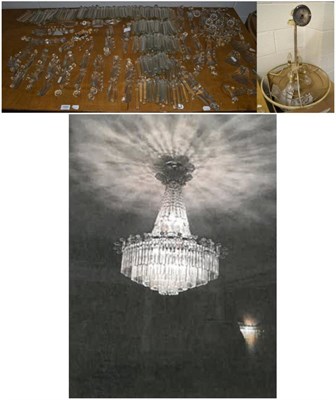 Lot 1095 - An impressive early 20th century cut glass chandelier of five tier graduated form and...